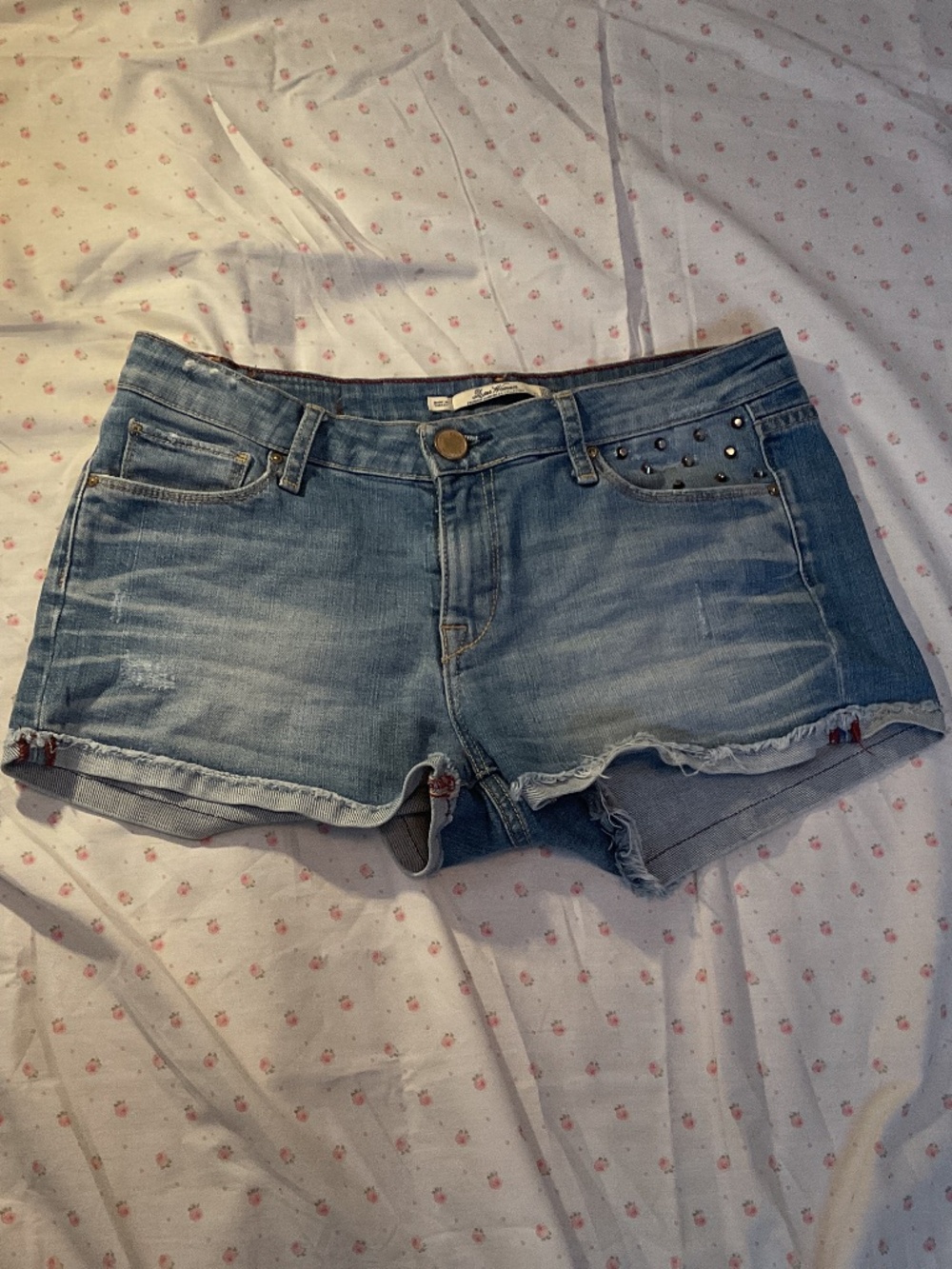 Low rise jean shorts with studs